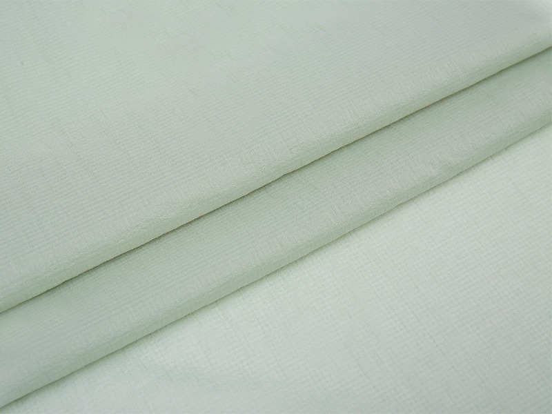Hvordan forbedrer polyester som forbedrer komforten av klær gjennom pusteevne?